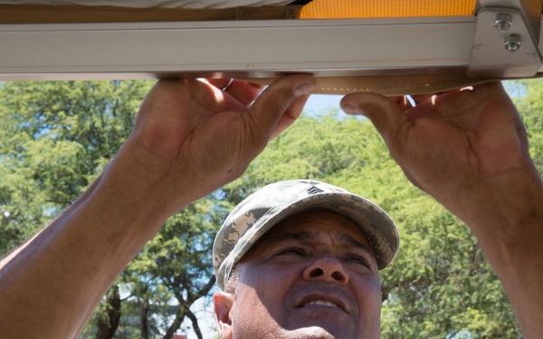 U.S. Army Soldiers assigned to 445th Civil Affairs Battalion setup a field hospital for RIMPAC