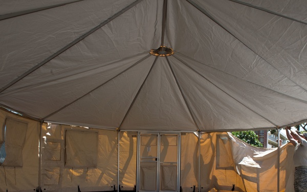 U.S. Army Soldiers assigned to 445th Civil Affairs Battalion setup a field hospital for RIMPAC