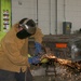 Metal Worker Cuts Away
