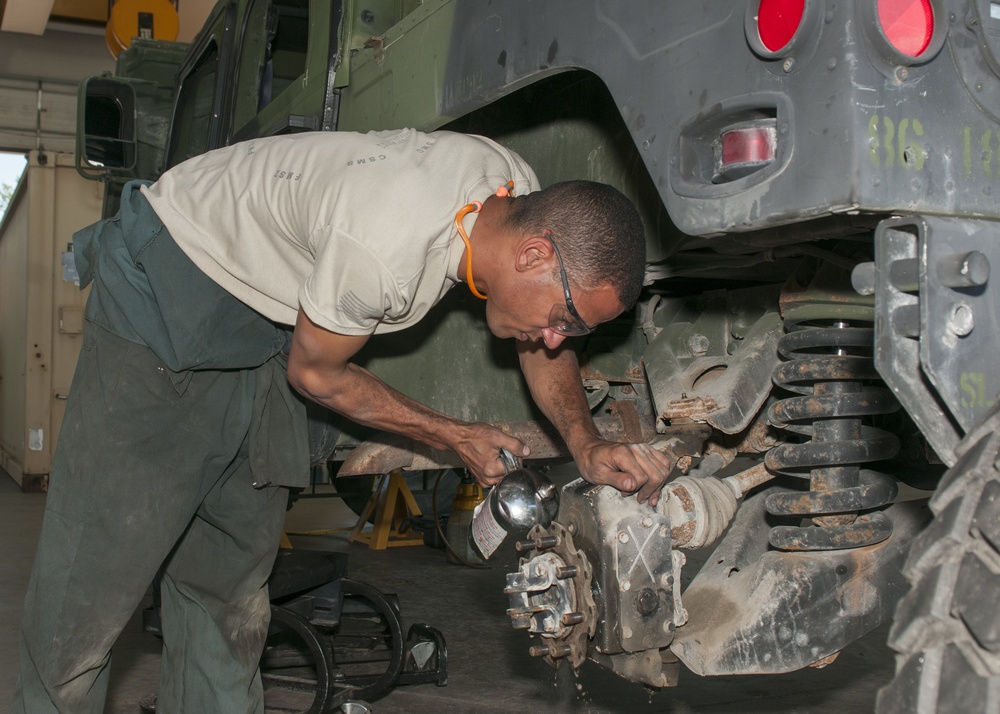 Mechnic Degreases HMMWV
