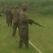 Combat Engineer students fire  shotguns during a familiarity fire