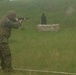 Combat Engineer student fires a shotgun during a familiarity fire