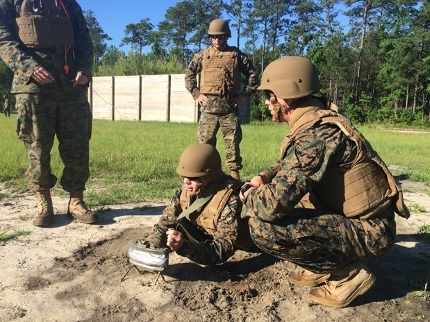 students attached to Combat Engineer Officer course 5-16 emplace a M18A1 Claymore Mine