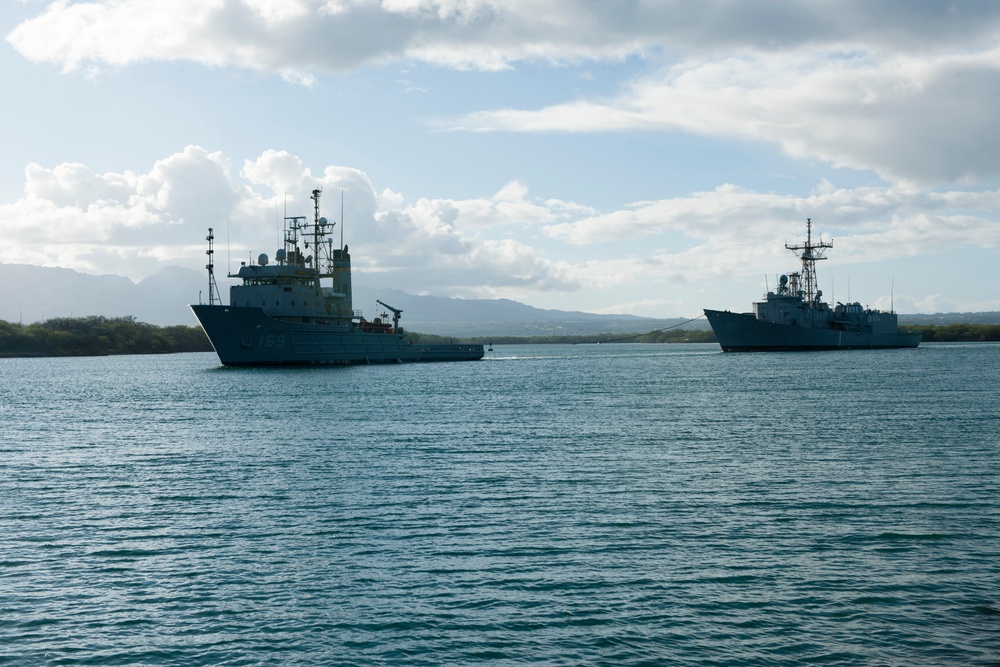 ex-USS Thach towed to sea during RIMPAC