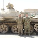 Deployed Soldier reunites with father in Kuwait