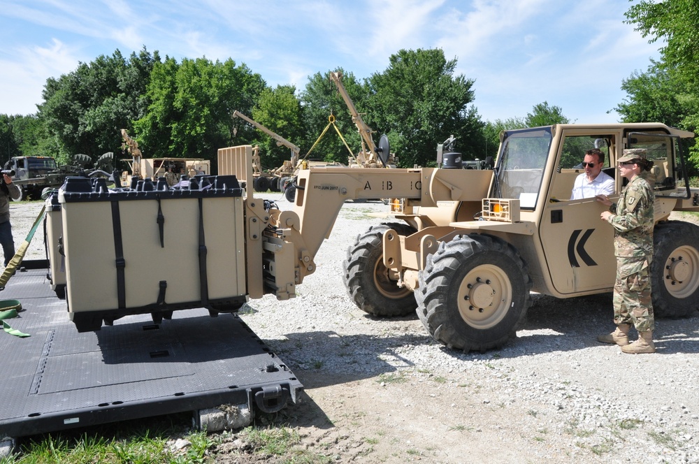 Loading a mule pack of Meals, Ready to Eat