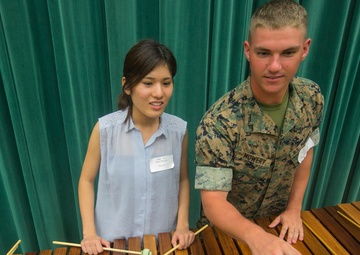 III MEF Band, local university bridge gap through music