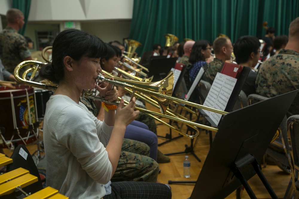 III MEF Band, local university bridge gap through music