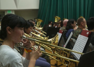 III MEF Band, local university bridge gap through music