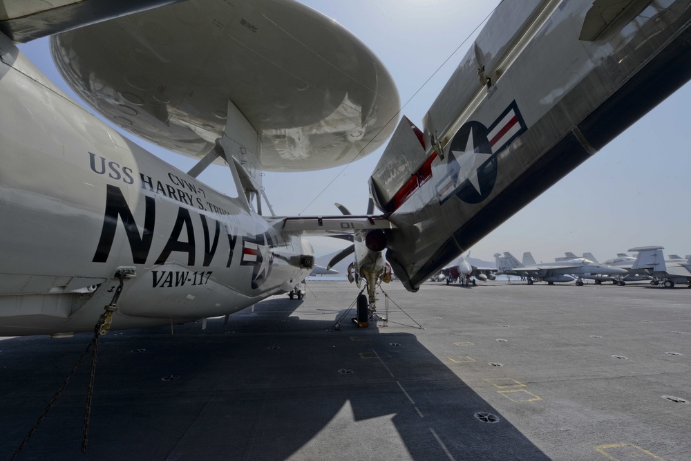 An E-2C Hawkeye, assigned to the &quot;Wallbangers&quot; of Carrier Airborne Early Warning Squadron (VAW) 117, on the flight deck of aircraft carrier USS Harry S. Truman (CVN 75)