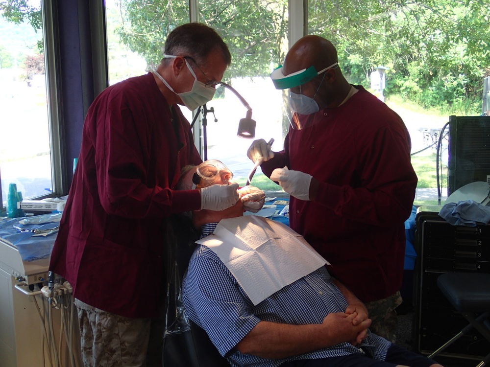 Service members provides dental care during the IRT event in Norwich, N.Y.