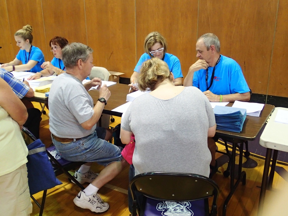 Volunteers check-in patients during the IRT event in Norwich, N.Y.