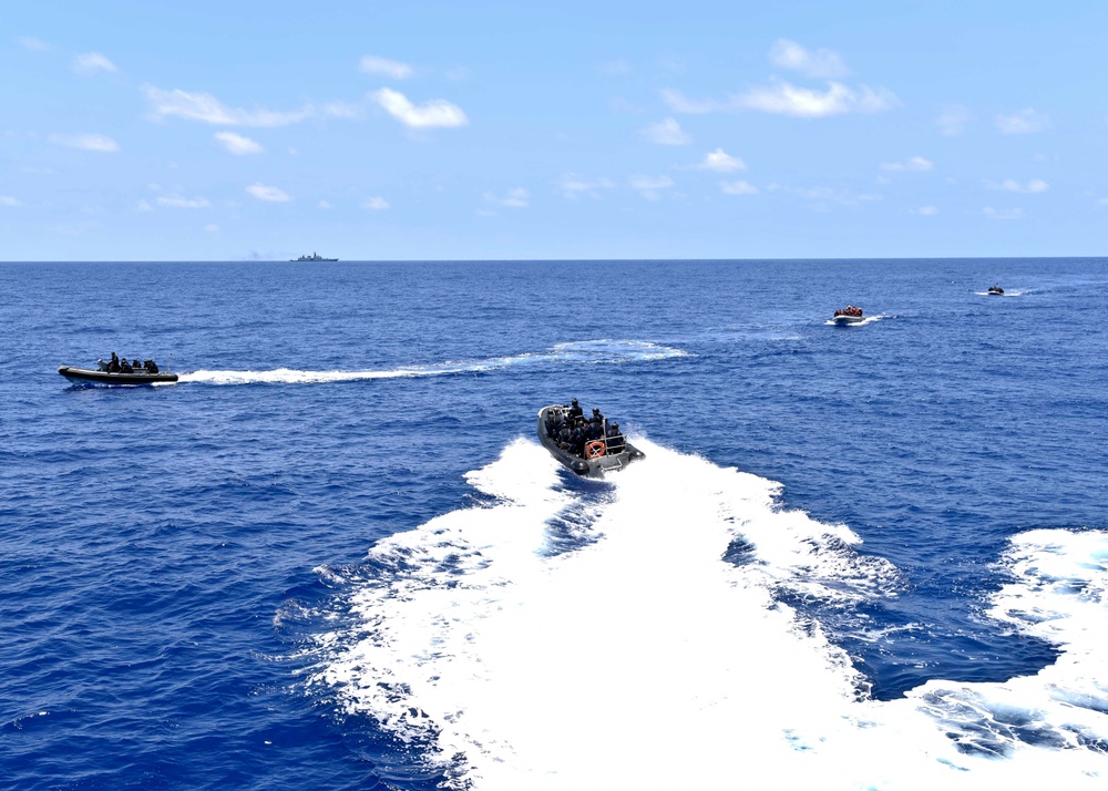 Chilean and U.S. Sailors conduct a joint VBSS exercise during RIMPAC