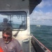 Rough waters, smooth rescue: Coast Guard pulls two men from Bogue Inlet after their boat capsizes