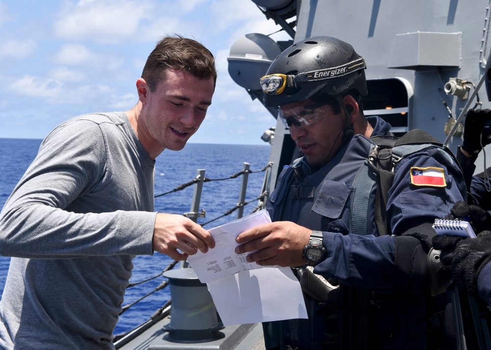 Chilean and US Sailors conduct a joint VBSS exercise during RIMPAC