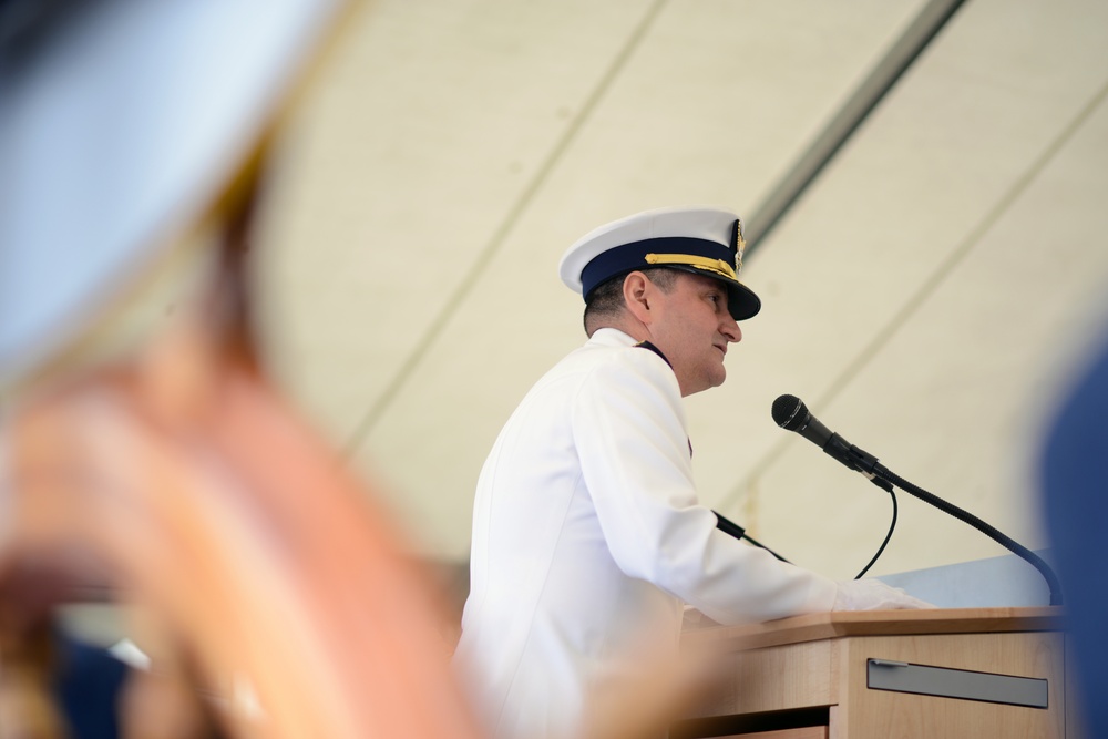Capt. Anthony Ceraolo reads his orders assuming command of Coast Guard Sector San Francisco