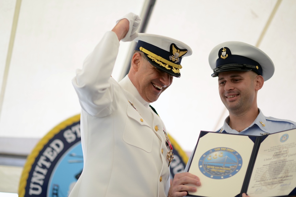 Capt. Greg Stump becomes an honorary chief during a change of command ceremony
