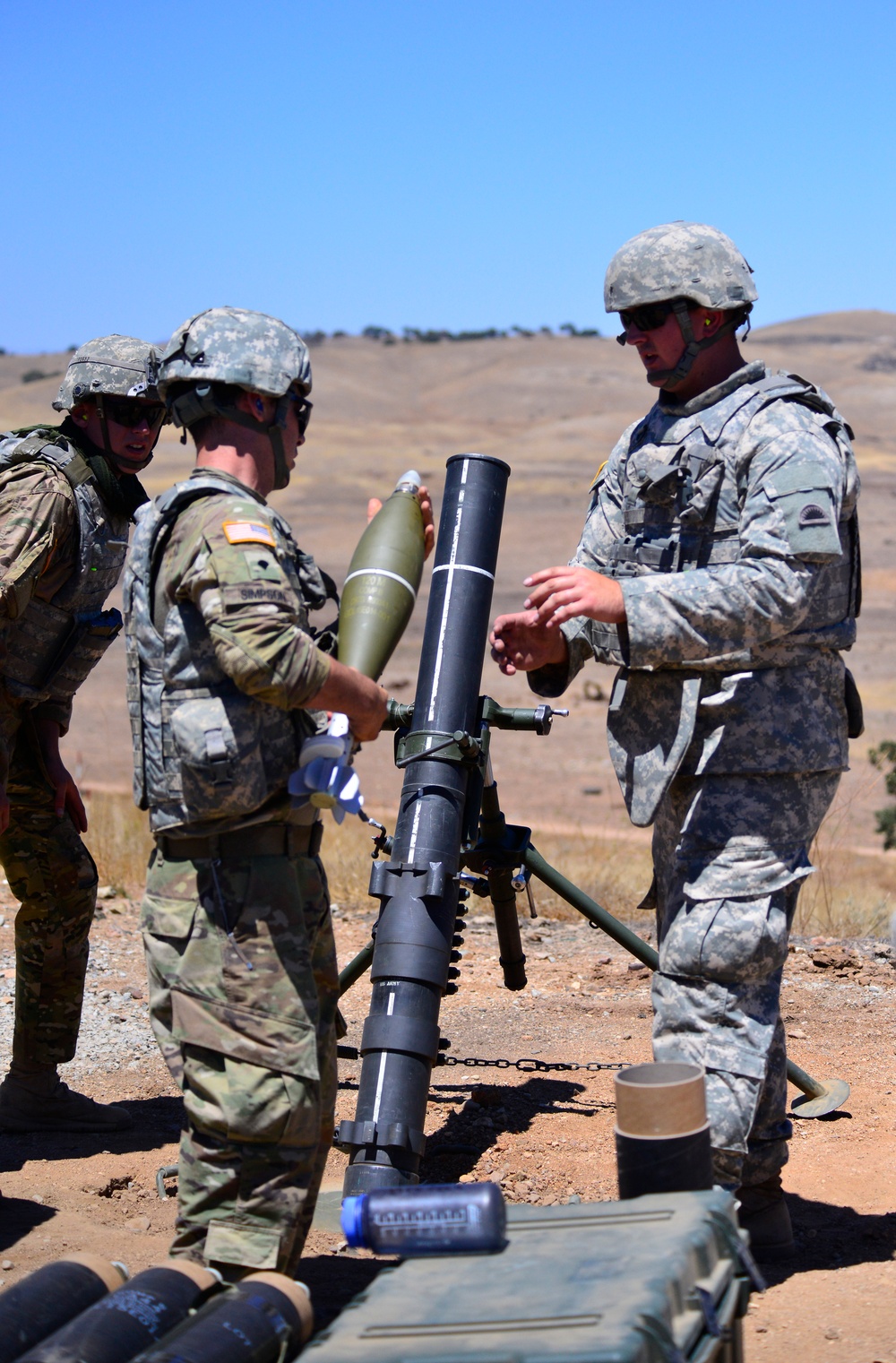 Oregon Soldiers hang mortars during annual training