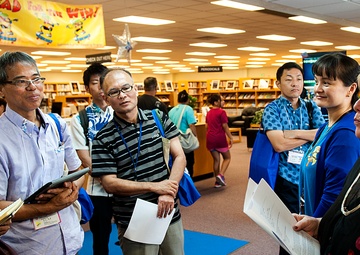 Okinawan librarians learn how Kadena’s library operates