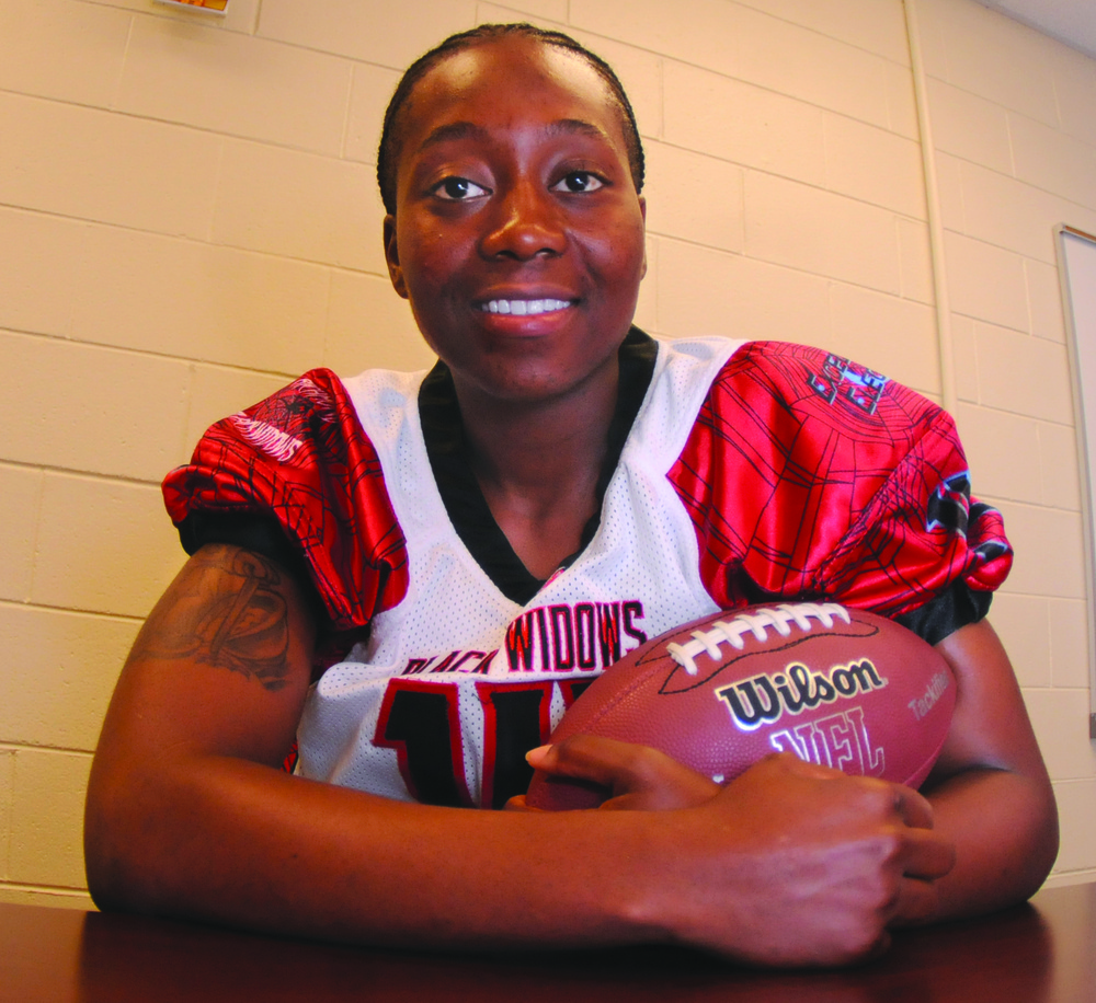 Grace on the gridiron: Soldier excels at football while tackling stereotypes