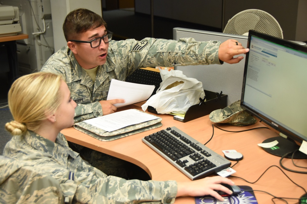 178th Airman helps fill out travel voucher
