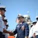 Lt. Cmdr. Christopher A. White conducts a personnel inspection during a change of command ceremony