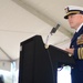 Lt. Cmdr. Lawrence F. Ahlin reads his orders assuming command of Coast Guard Maritime Safety and Security Team San Francisco