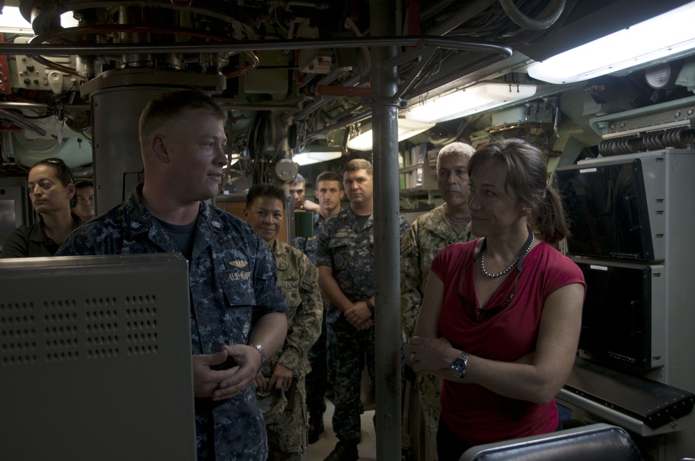 USS Chicago CO explains the control center to UNSECNAV during tour July 22