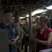 USS Chicago CO explains the control center to UNSECNAV during tour July 22