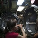 UNSECNAV looks inside a torpedo tube during USS Chicago (SSN 721) tour July 22