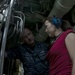 USS Chicago FT2 explains water slugs to UNSECNAV during tour July 22