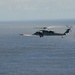 Helicopter fires missile during RIMPAC