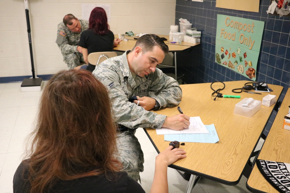 Service members provide medical care during IRT event in Homer, N.Y.