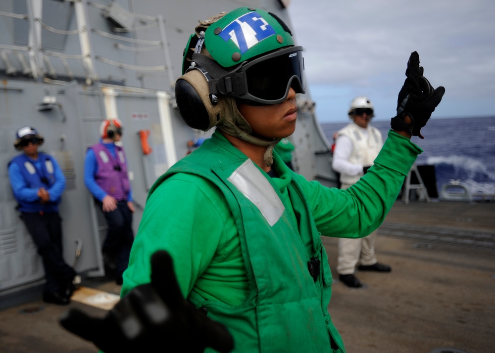 HSM-73 Sailor Signals MH-60S Sea Hawk at RIMPAC 16