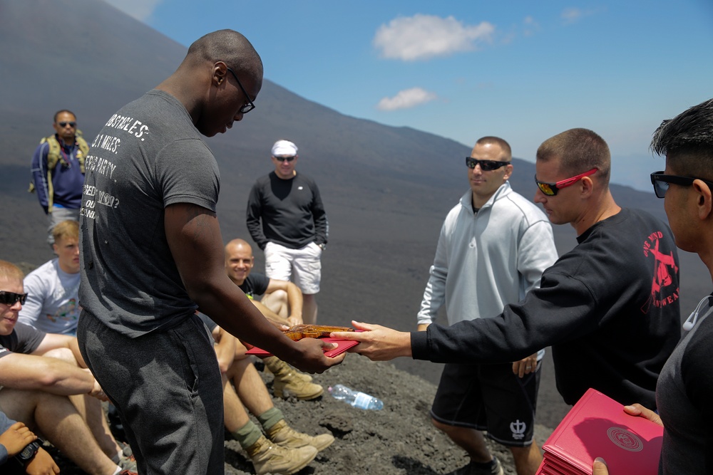 Marines climb volcano for MAI graduation
