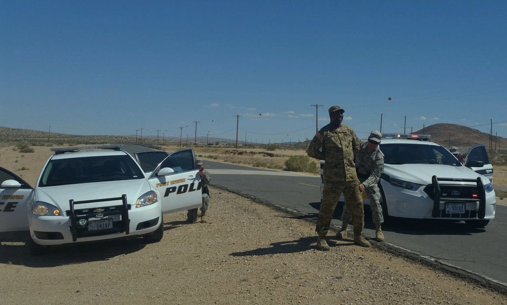 Capt. McCoy trains 650th RSG military police at Ft. Irwin
