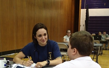Sailor takes vital patient information during IRT in Norwich, N.Y.