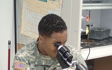 Service members check glasses prescription.