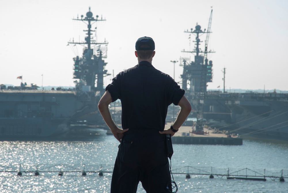 USS George H. W. Bush (CVN 77) leaves
Norfolk Naval Shipyard (NNSY) July 23 after completing a 13-month planned
incremental availability. GHWB will now conduct sea trials in collaboration
with NNSY to evaluate Sailors' performance in addition to testing e