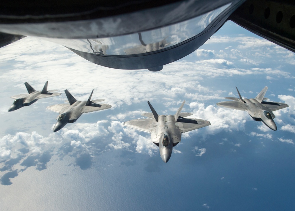 KC-135R Stratotanker refuels F22 Raptors during RIMPAC 2016