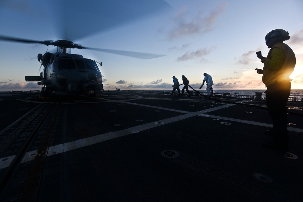 USS Shoup conducts night flight operations during RIMPAC 2016