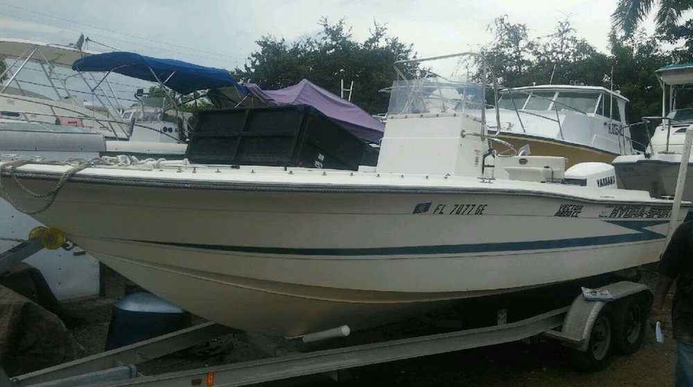 A picture of a white, 23-foot Hydra-Sport, Florida tag 7077GE, belonging to Venice Graham of Hallandale Beach, Florida.