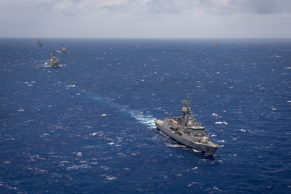 Forty Ships and Submarines Steam in Close Formation During RIMPAC