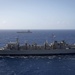 Forty Ships and Submarines Steam in Close Formation During RIMPAC - USNS Rainier (T-AOE 7)