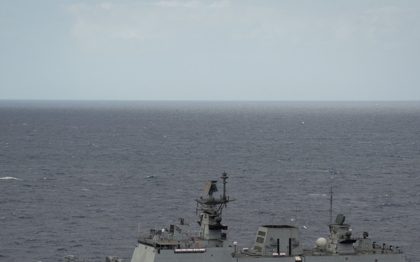 Forty Ships and Submarines Steam in Close Formation During RIMPAC - INS Satpura (F48)