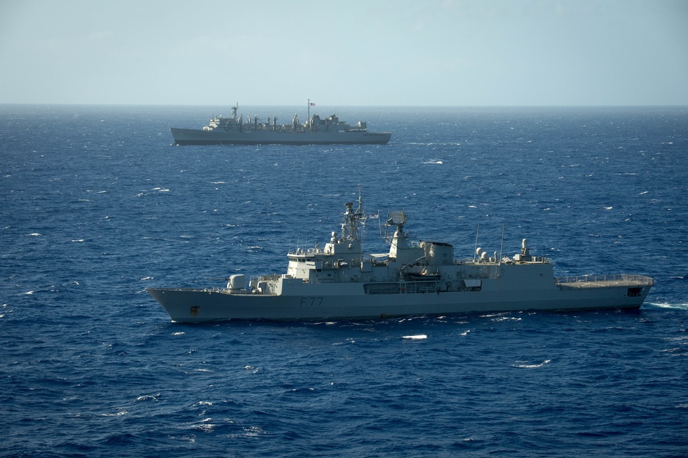 Forty Ships and Submarines Steam in Close Formation During RIMPAC - HMNZS Te Kaha (F77) and USNS Henry J. Kaiser (T-AO 187)