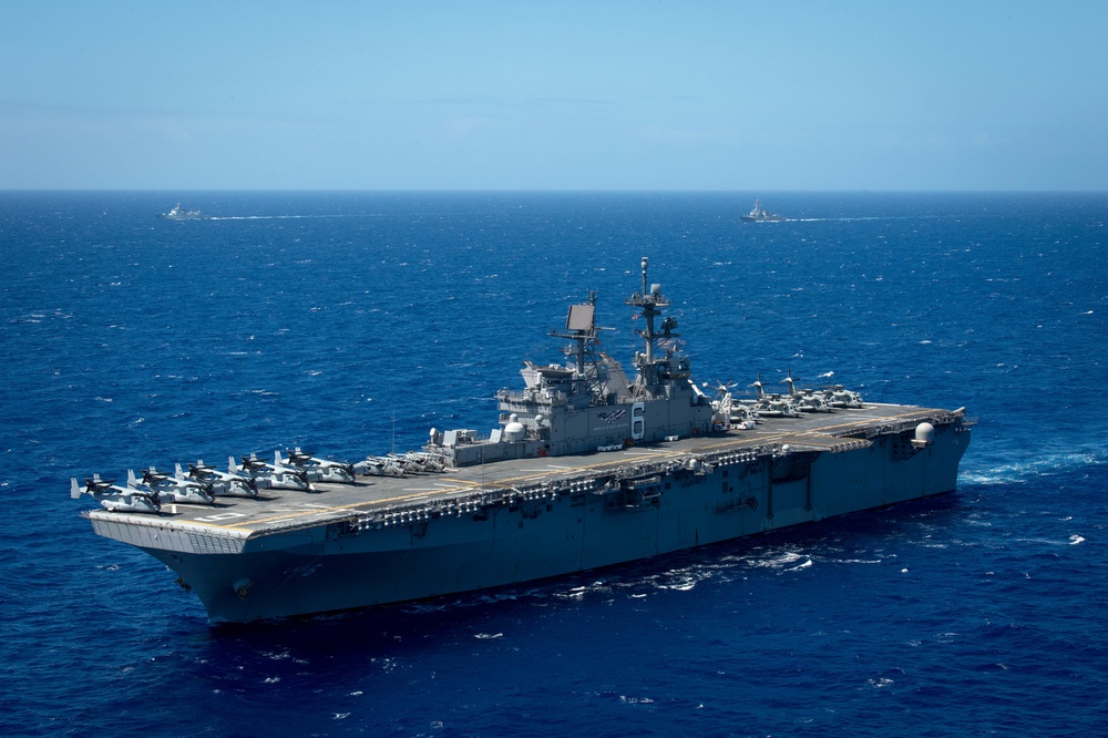 Forty Ships and Submarines Steam in Close Formation During RIMPAC - USS America (LHA 6)