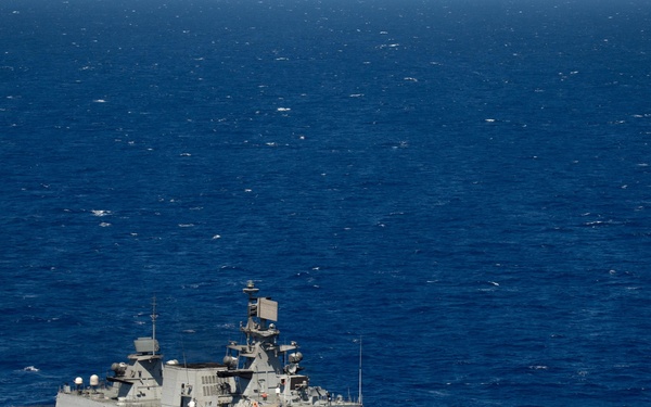 Forty Ships and Submarines Steam in Close Formation During RIMPAC - INS Satpura (F48)