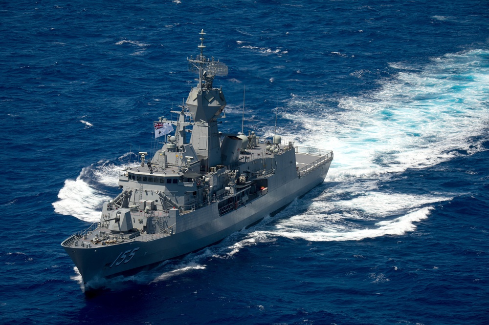 Forty Ships and Submarines Steam in Close Formation During RIMPAC - HMAS Ballarat (FFH 155)