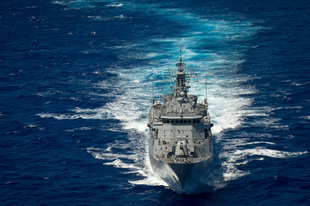 Forty Ships and Submarines Steam in Close Formation During RIMPAC - HMNZS Te Kaha (F77)